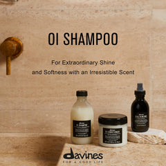 Davines OI Shampoo pour shot shows easy, gentle wash in hand.