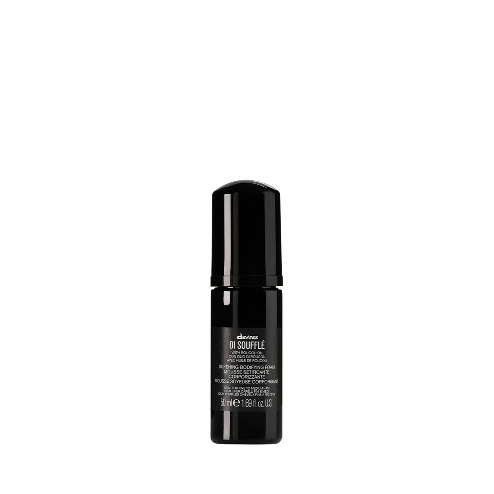 Davines OI Soufflé bottle close-up for premium styling.