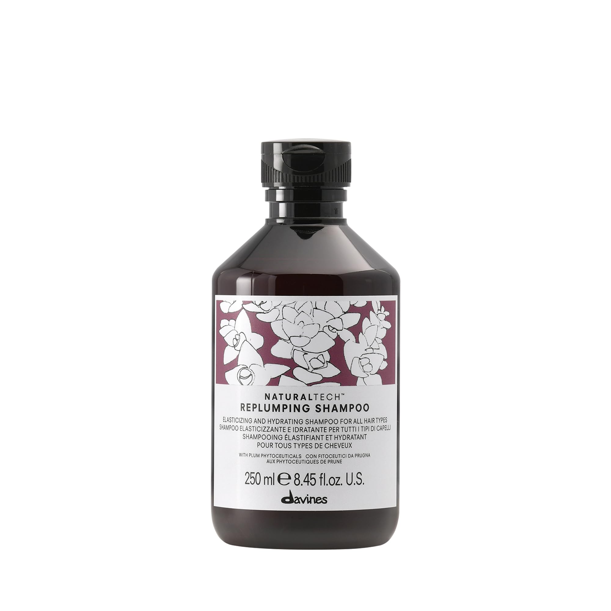 Davines Replumping Shampoo bottle-front with rich foam signaling elasticity