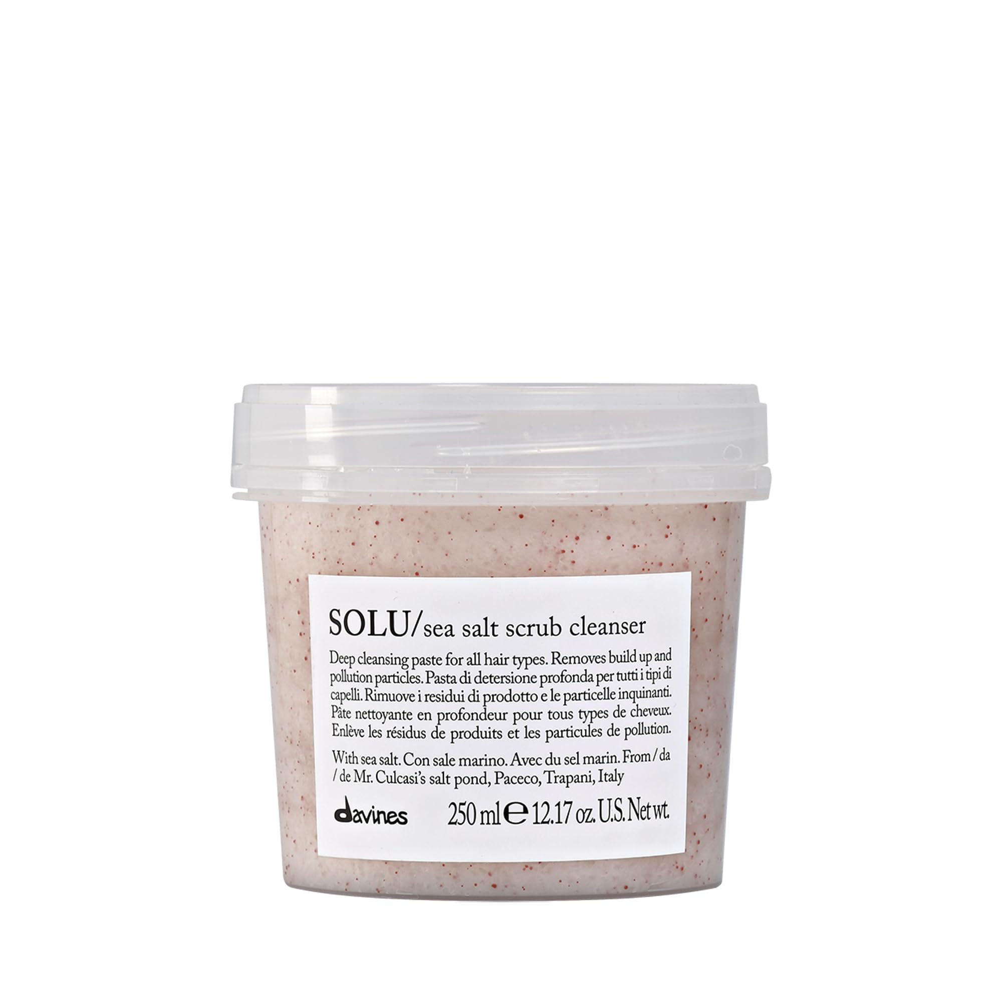 Davines SOLU sea salt scrub cleanser bottle close-up, highlighting cleansing action for the scalp.