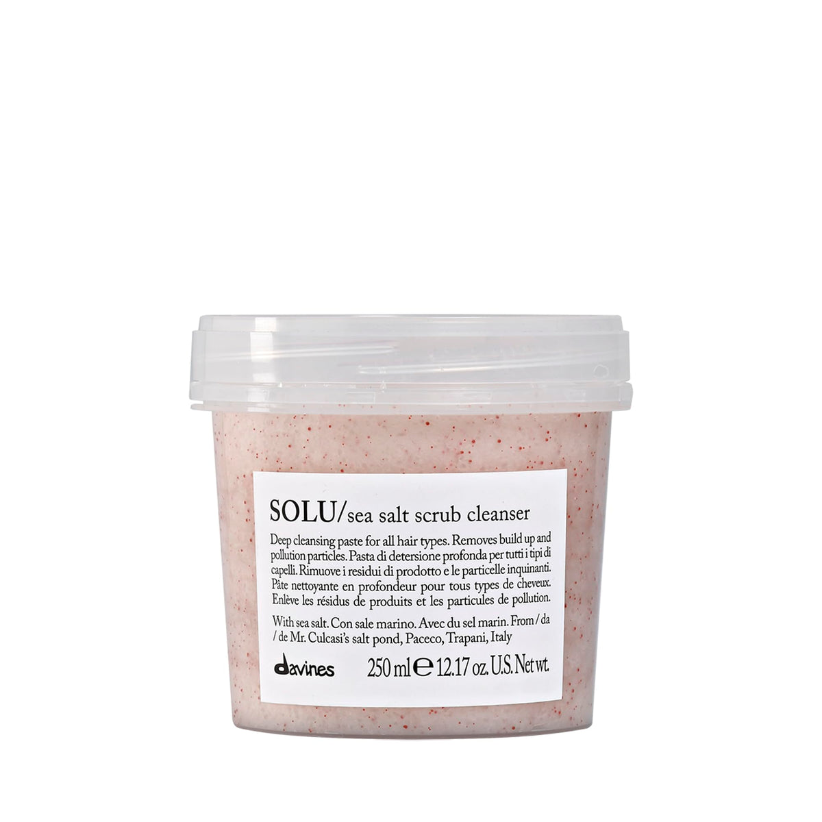 Davines SOLU sea salt scrub cleanser bottle close-up, highlighting cleansing action for the scalp.