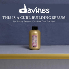 Davines This Is A Curl-Building Serum on hand showing lightweight texture