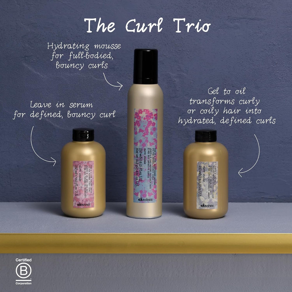 Davines This Is A Curl Moisturizing Mousse hair in motion shows defined waves
