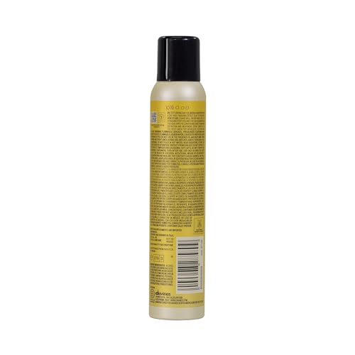 Close-up of Davines This Is A Dry Wax Finishing Spray showing undone texture and flexible hold.