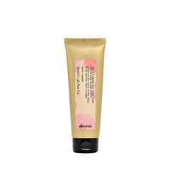 Davines This Is A Medium Hold Pliable Paste packaging shows a sleek jar for versatile styling