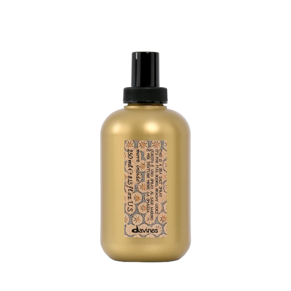 Davines This Is A Sea Salt Spray bottle close-up showing matte finish texture for beach-ready style.