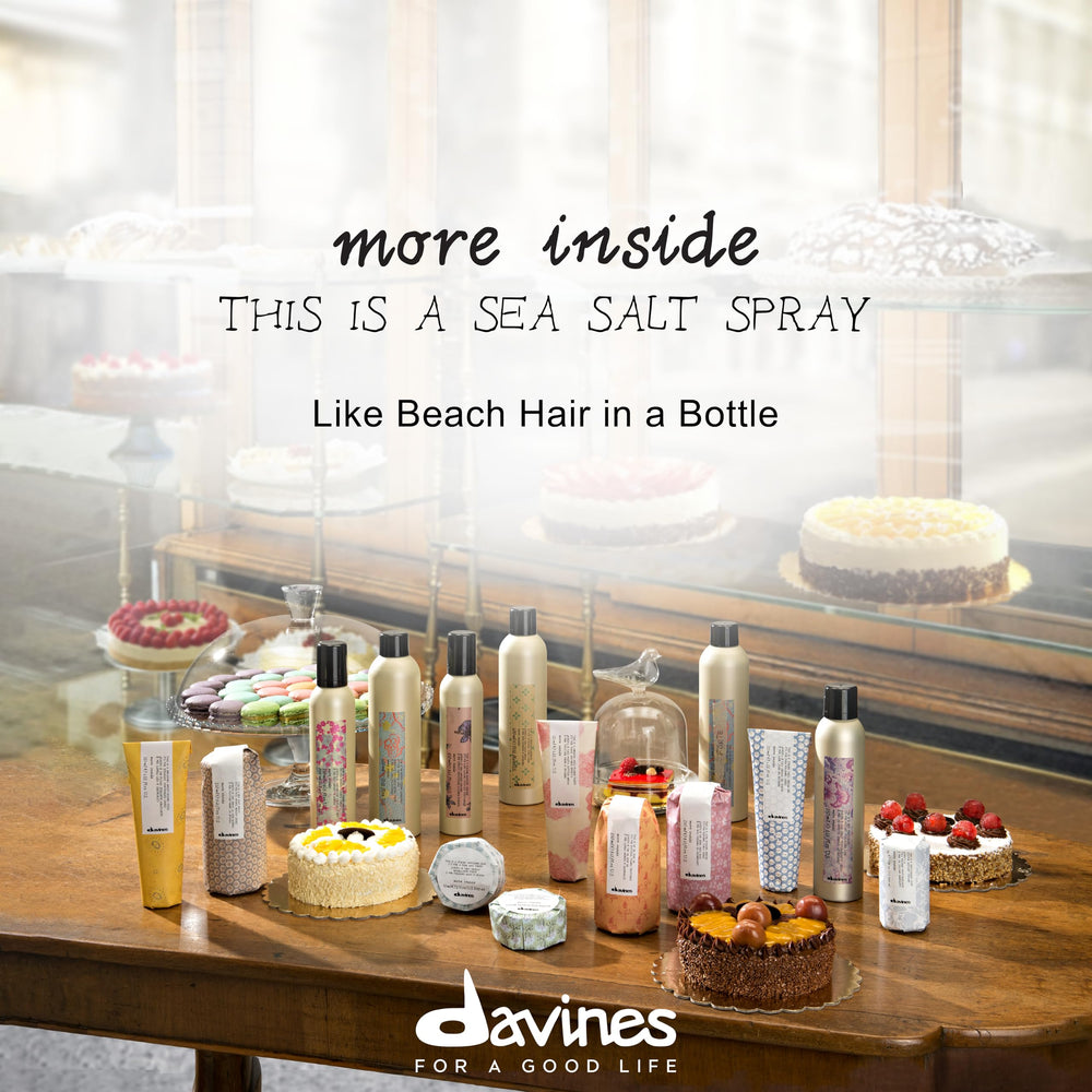 Hair with enhanced texture and natural waves using Davines sea salt spray.