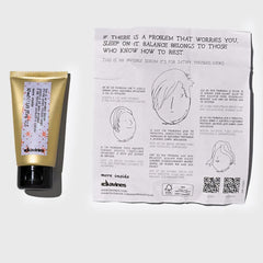 Davines This Is An Invisible Serum application swatch shows quick, glossy anti-frizz results.