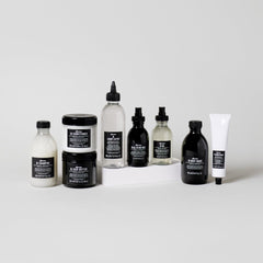 Davines OI Hair Butter packaging lifestyle image emphasizes premium, versatile treatment