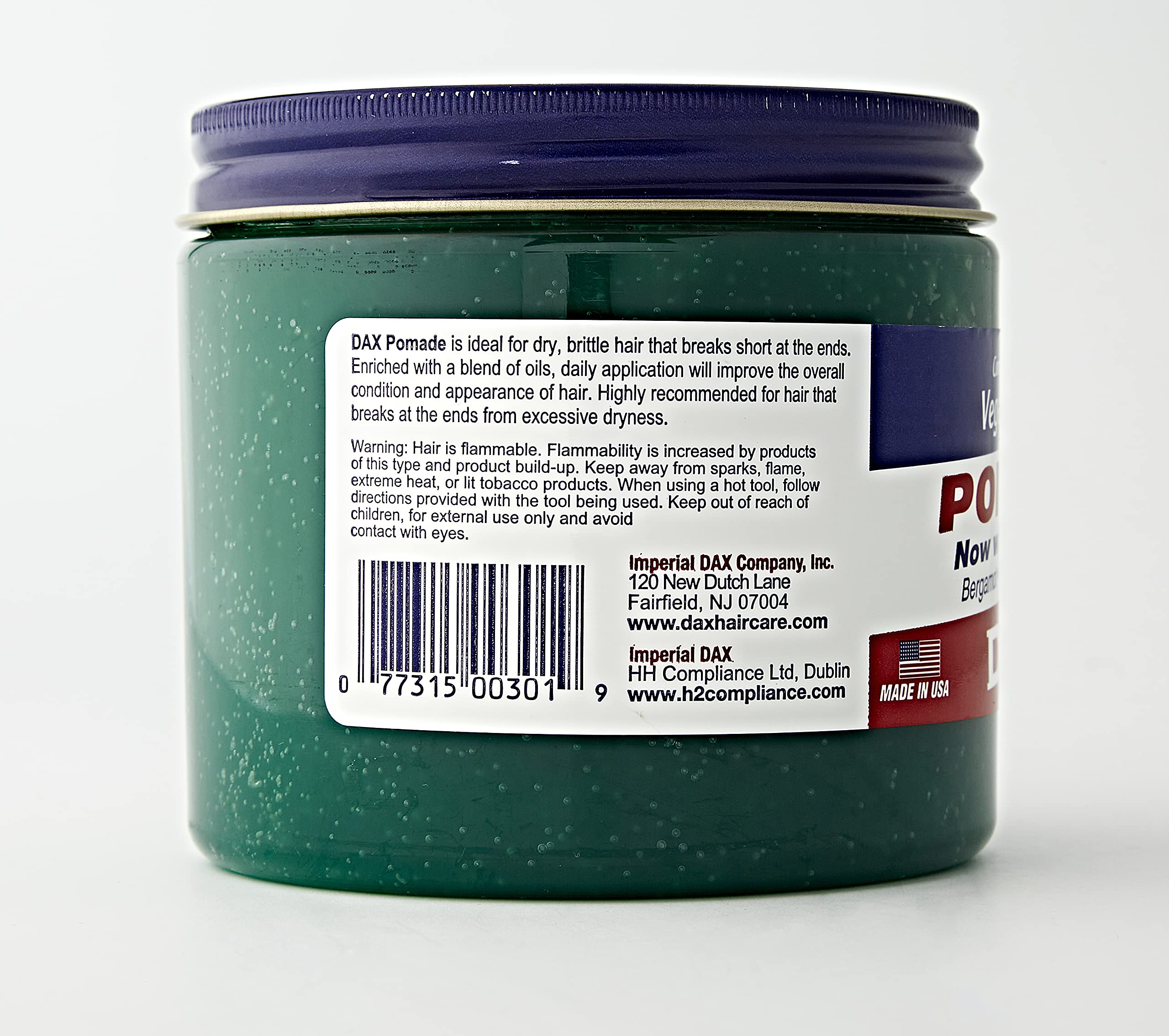 DAX Pomade packaging label on 14 ounce tub.
