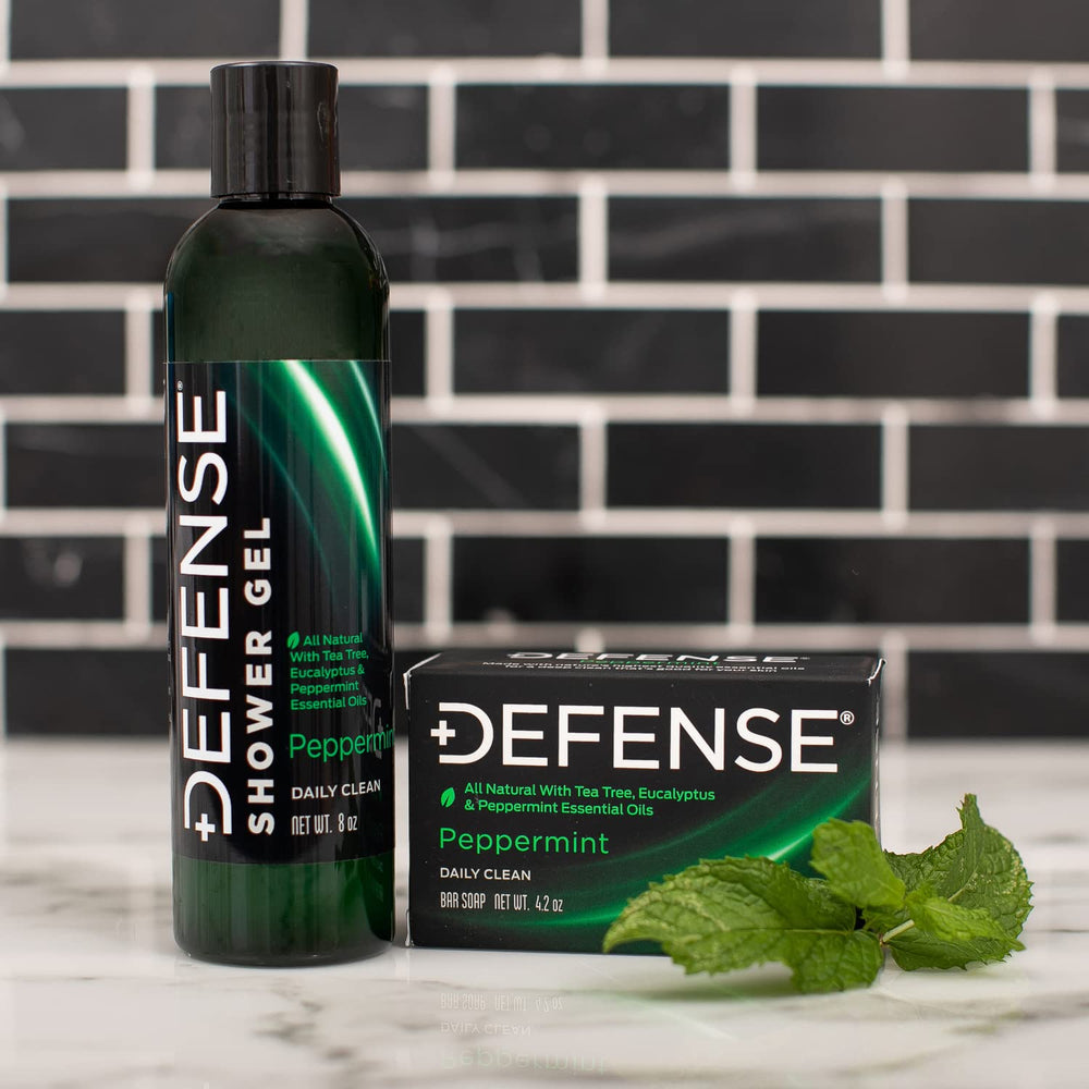 Defense Soap bar resting on damp hands signaling easy cleansing