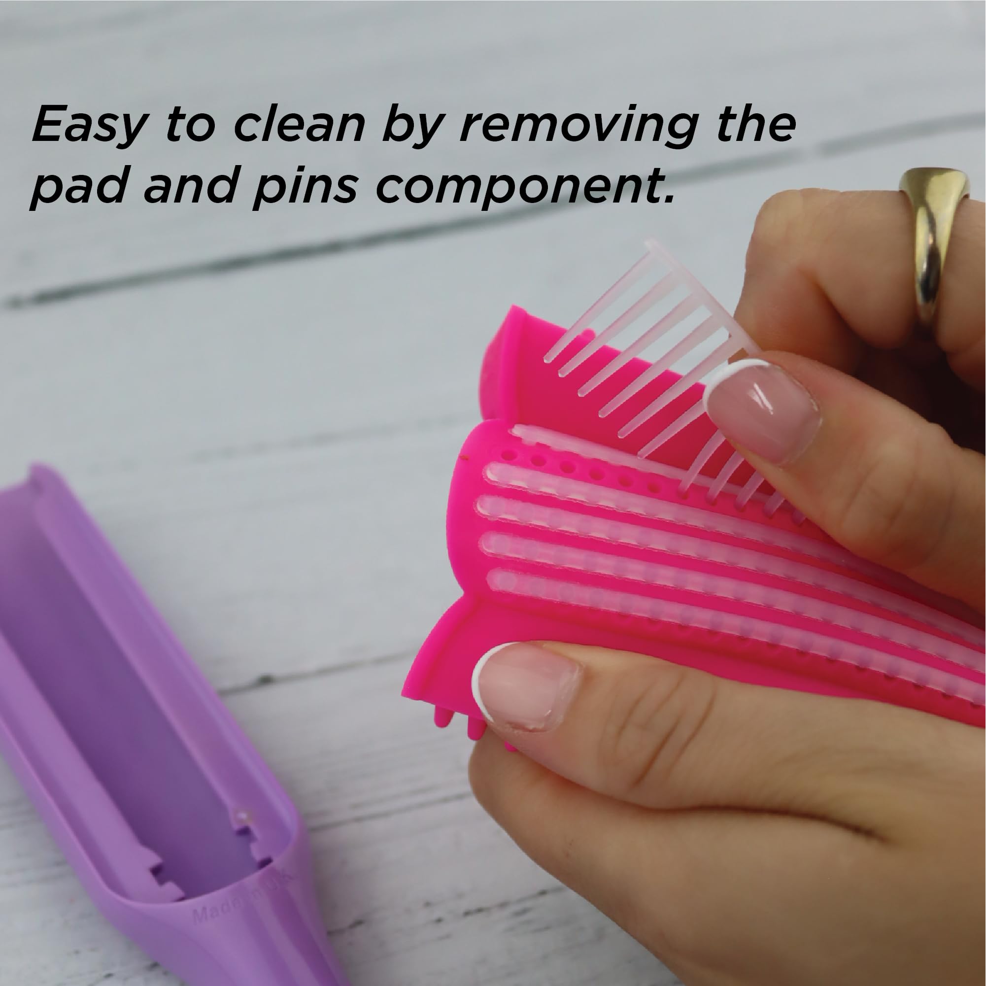 Denman Curly Hair Brush D3 round-ended pins for gentle brushing.