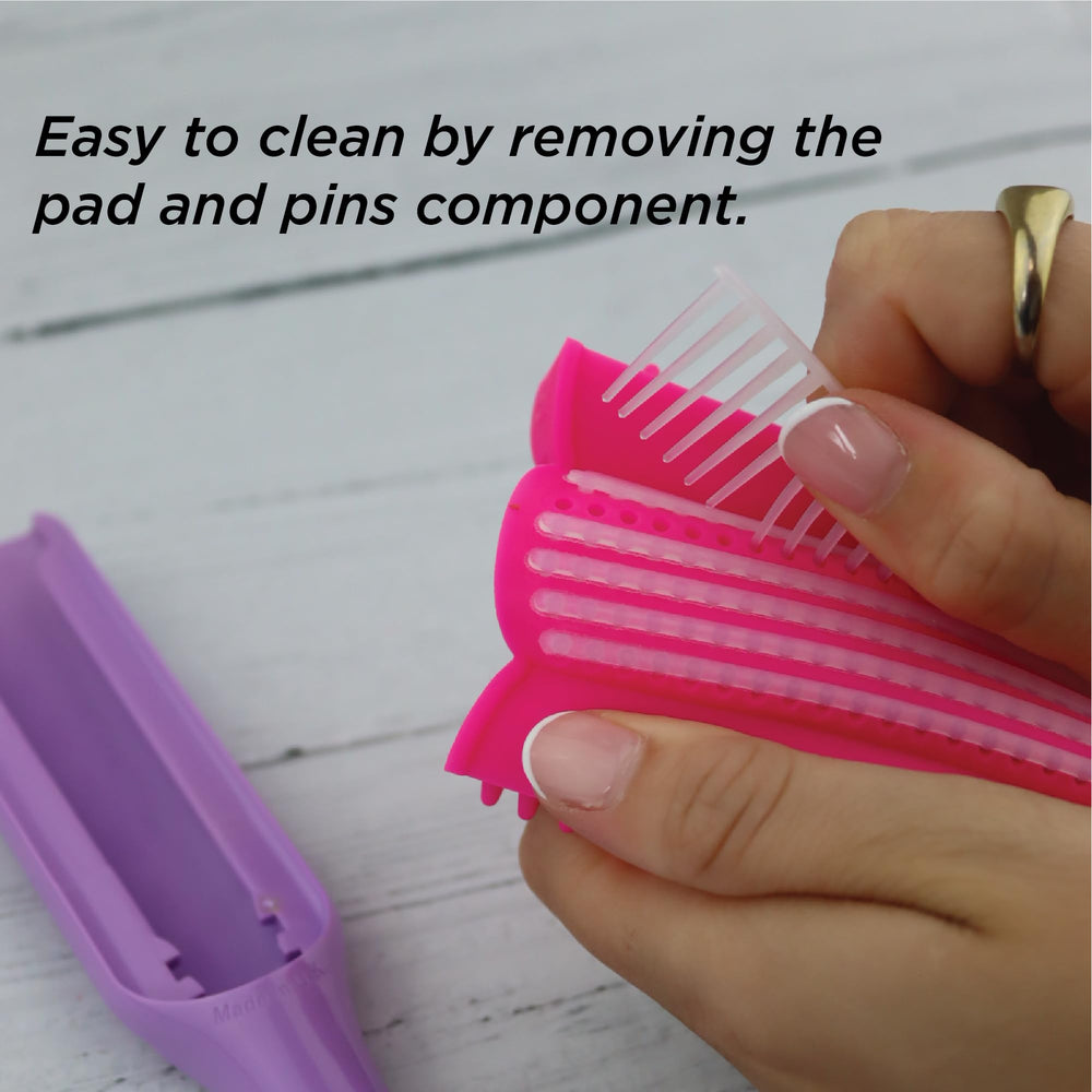 Denman Curly Hair Brush D3 round-ended pins for gentle brushing.