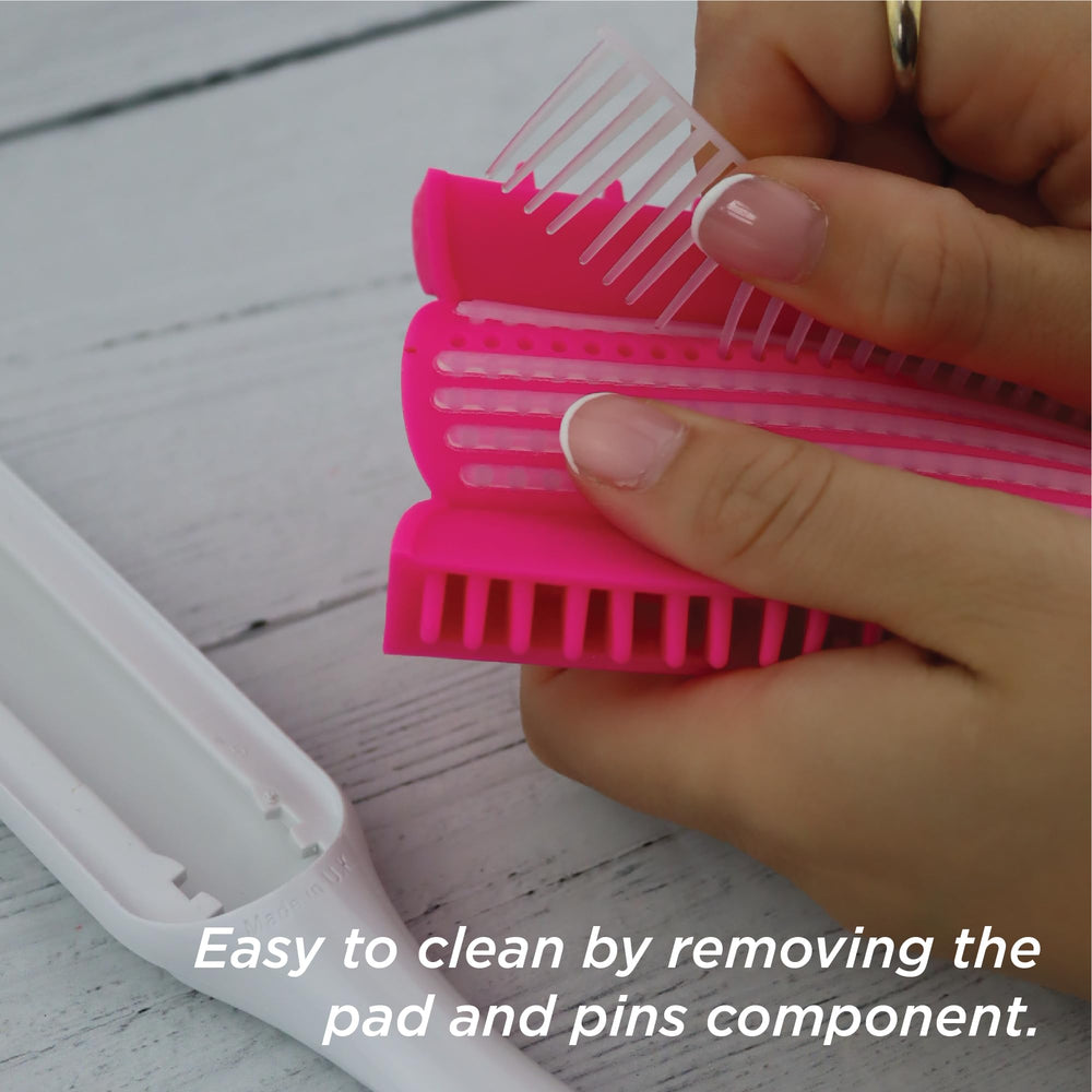 Staggered pins in Denman D3 create even tension for shaping curls