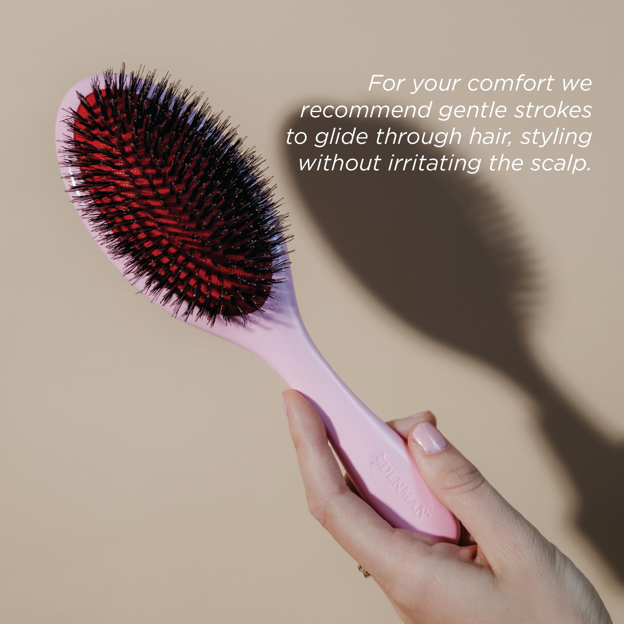Denman Pink Crush aiding curl definition and frizz control.