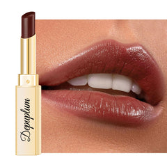 Depuplum Black Berry Lipstick tube closeup shows creamy texture and rich color.
