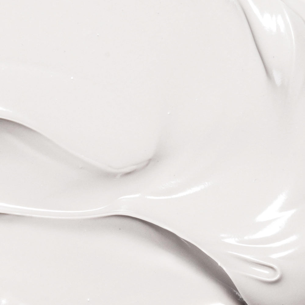 Aplicación diaria de Derma E Vitamina E en rostro, cuello y cuerpo.