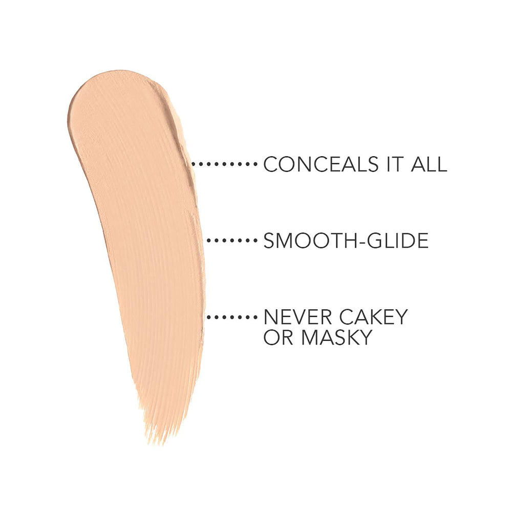 Applying Dermablend Quick Fix Concealer Stick demonstrates precise coverage for dark spots.