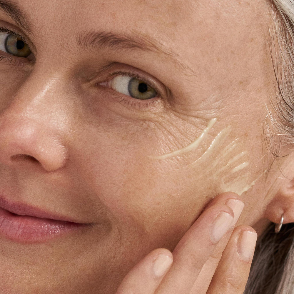 Dermalogica Dynamic Skin Retinol Serum bottle in hand for on-the-go use.