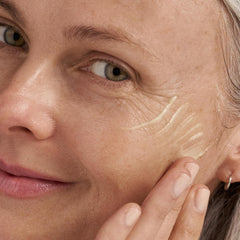 Dermalogica Dynamic Skin Retinol Serum bottle in hand for on-the-go use.
