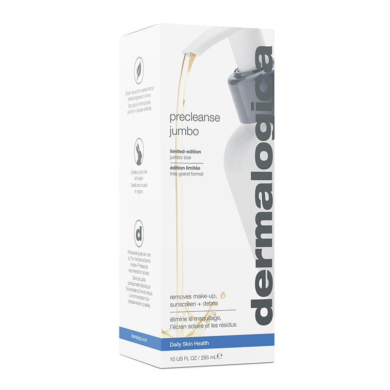 Applying PreCleanse on dry skin to dissolve makeup.