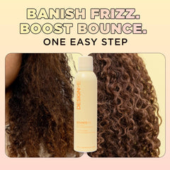 Design.Me BOUNCE.ME Curl Mousse foam on damp hair for smooth, frizz-free curl shaping.