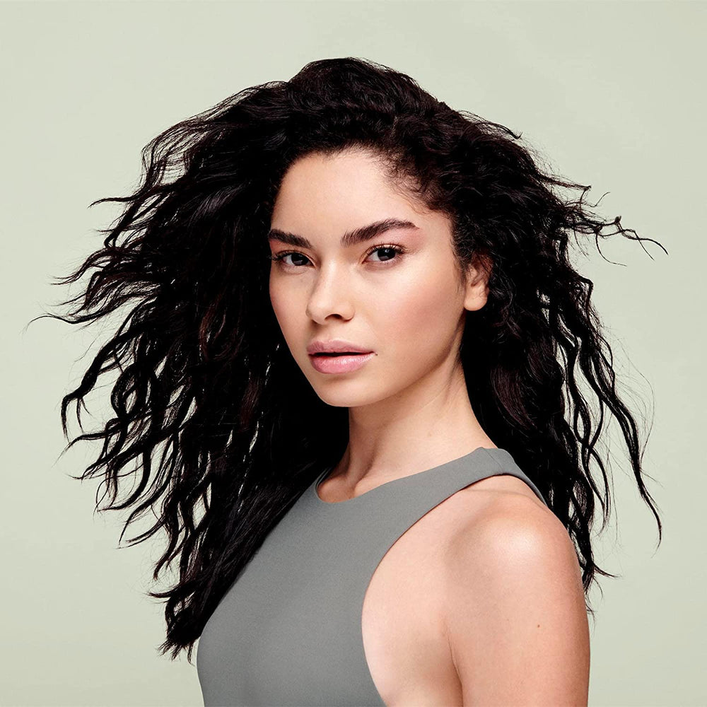 DevaCurl curly-definition closeup highlights touchable definition and clumped curls