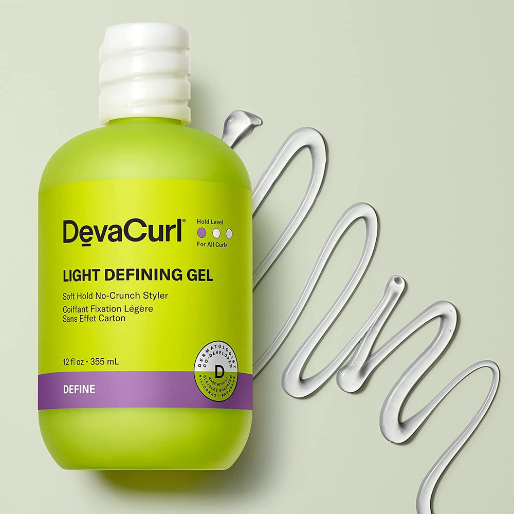 DevaCurl Light Defining Gel Soft Hold closeup highlights smooth application and non-sticky texture.