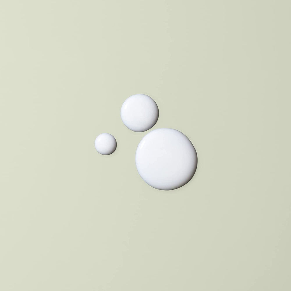 DevaCurl Moisture Seal curl body clumping demonstrates enhanced curl definition.