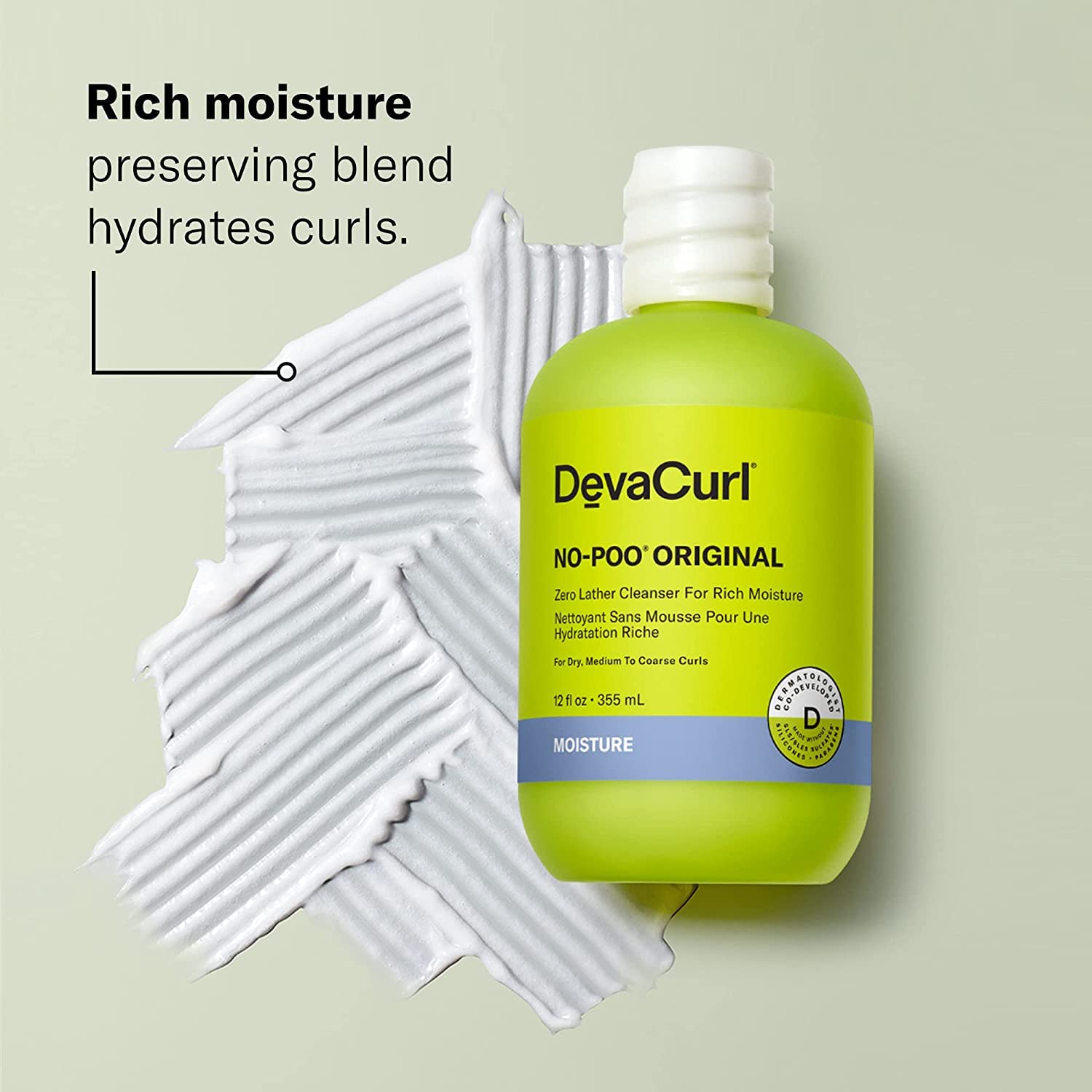 Close-up of the non-lathering cleanser texture for dry, coarse curls.