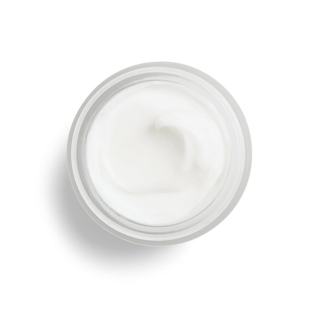 DHC Extra Nighttime Moisture texture swirls imply rich nourishing night care.