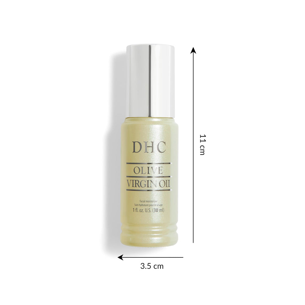 DHC Olive Virgin Oil dropper releasing oil for facial application and quick absorption.