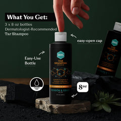 Hands lathering DHS coal tar shampoo to demonstrate cleansing action.