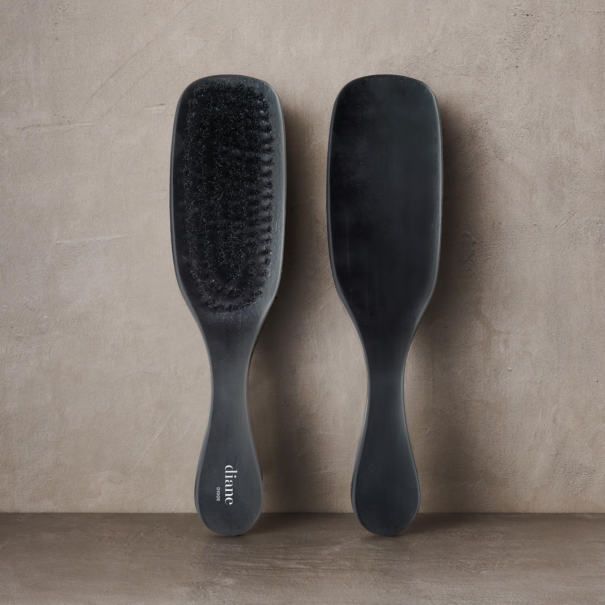Diane boar curve brush smoothing and defining waves with ease.