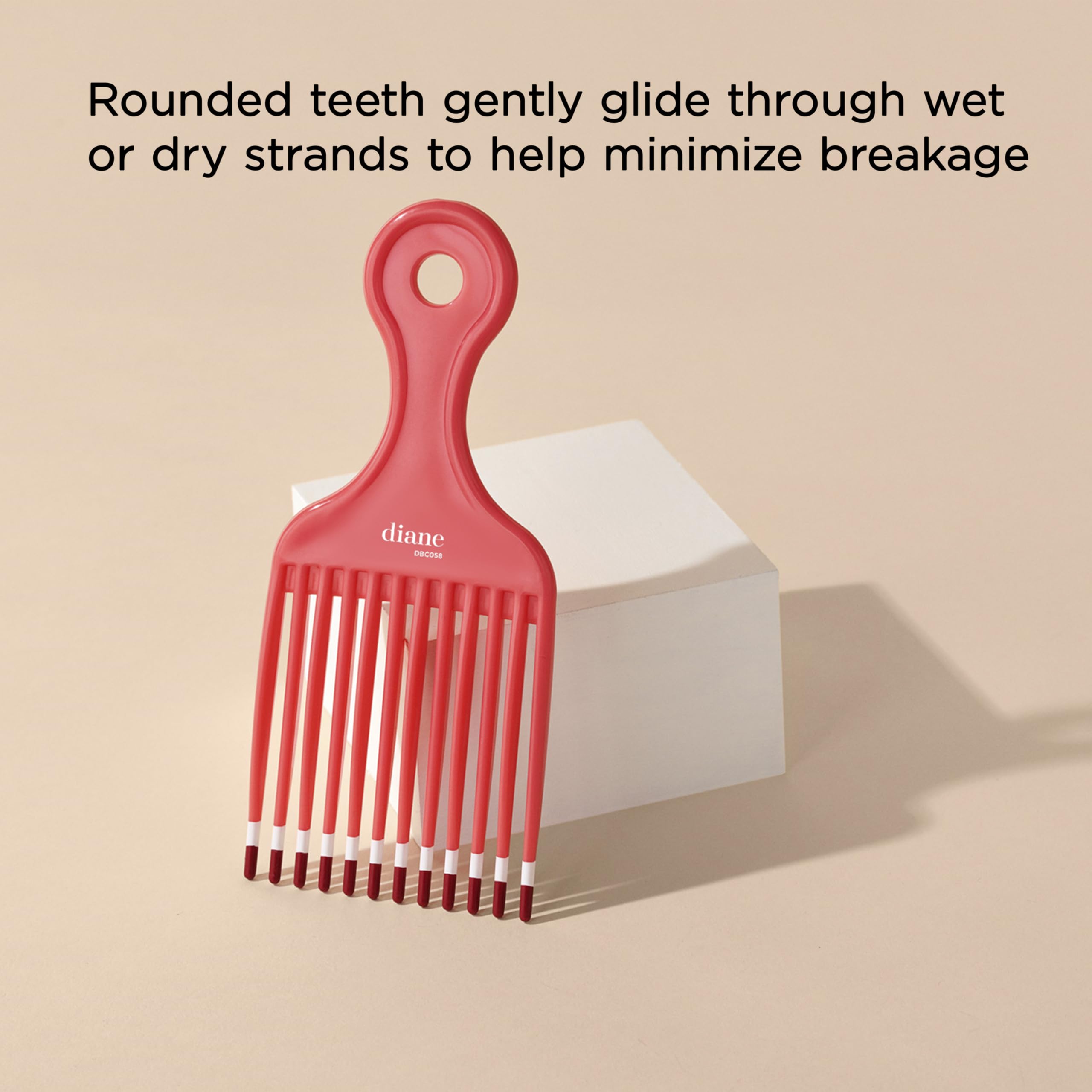 Diane hair pick with rounded teeth glides through wet or dry hair.