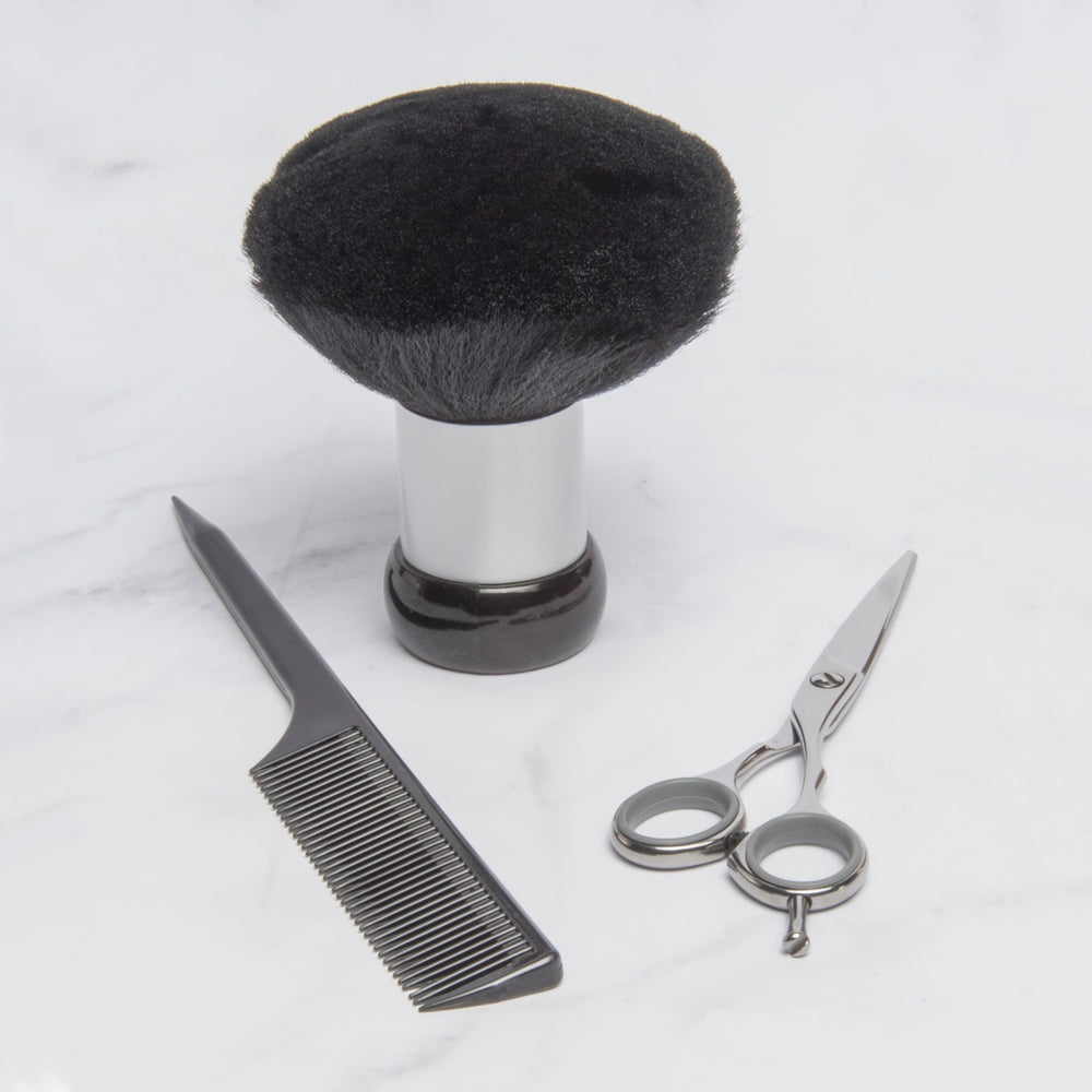 Diane Neck Duster Brush post-cut cleanup in a salon setting.