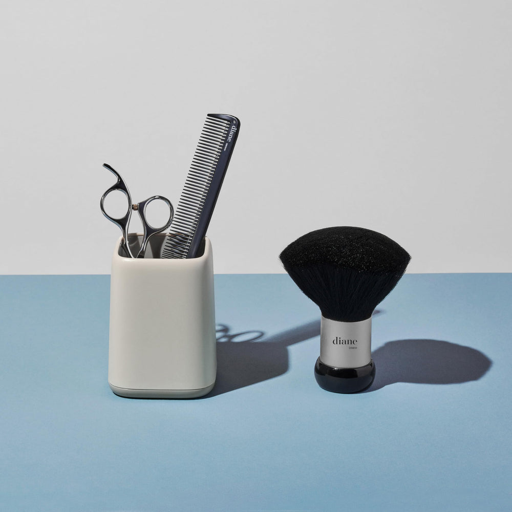 Diane Neck Duster Brush used at home for grooming and cleanup.