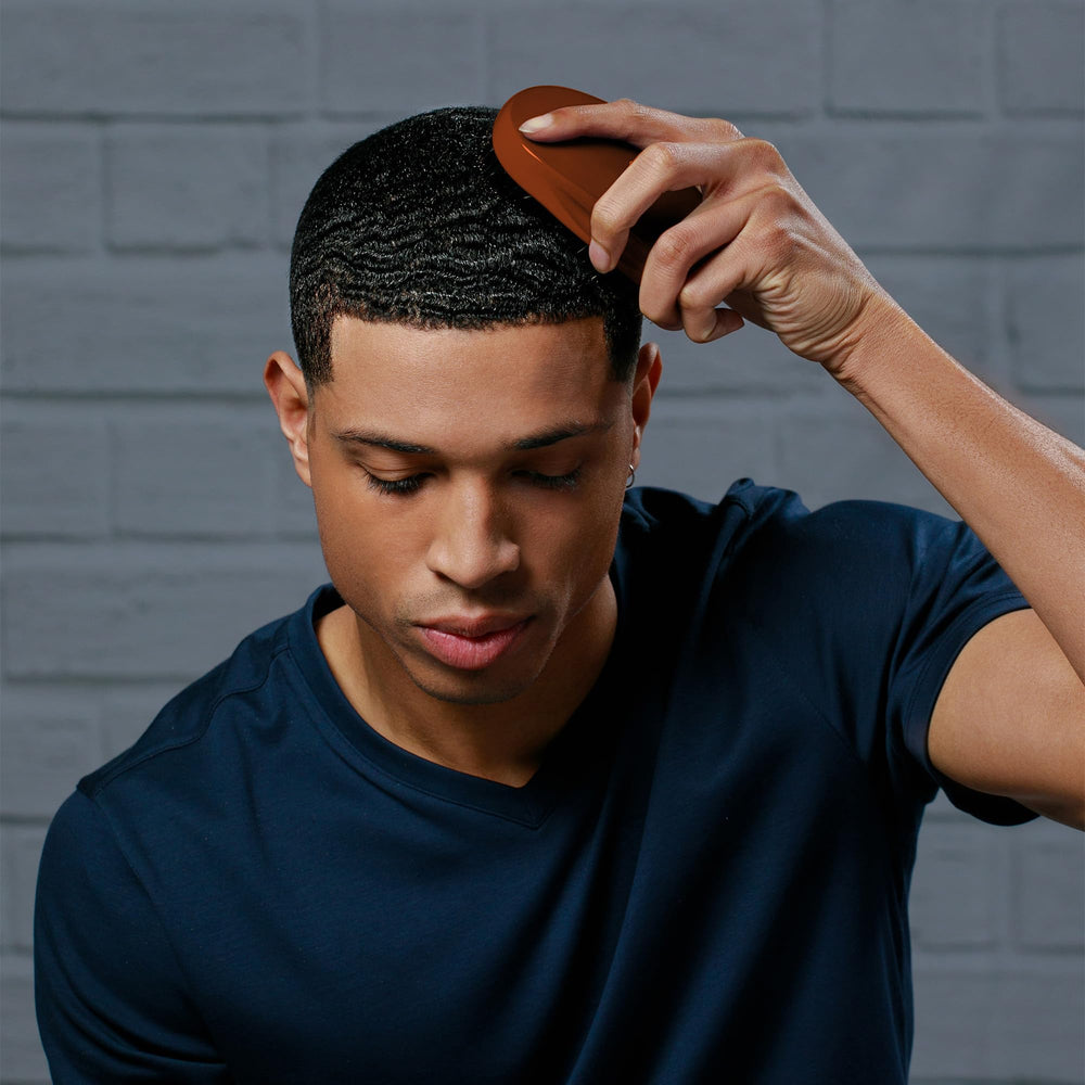 Diane Premium Boar Military Wave Brush smoothing textured hair during styling.