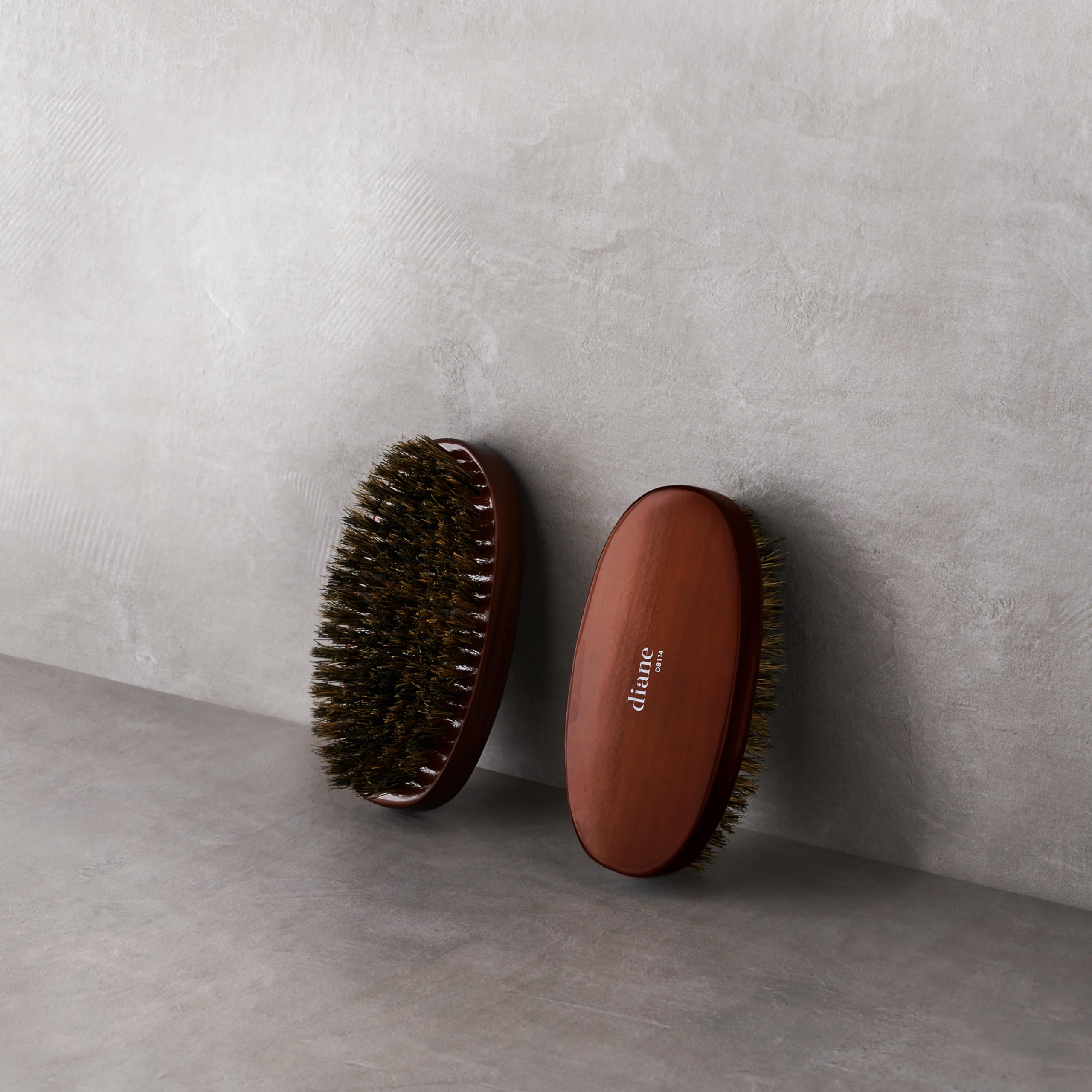 Diane Premium Boar Military Wave Brush distributes oils for shine.