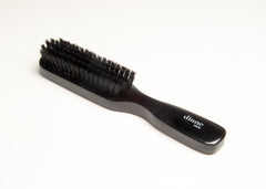 Diane wood-base brush offers durability and reduced bristle loss.