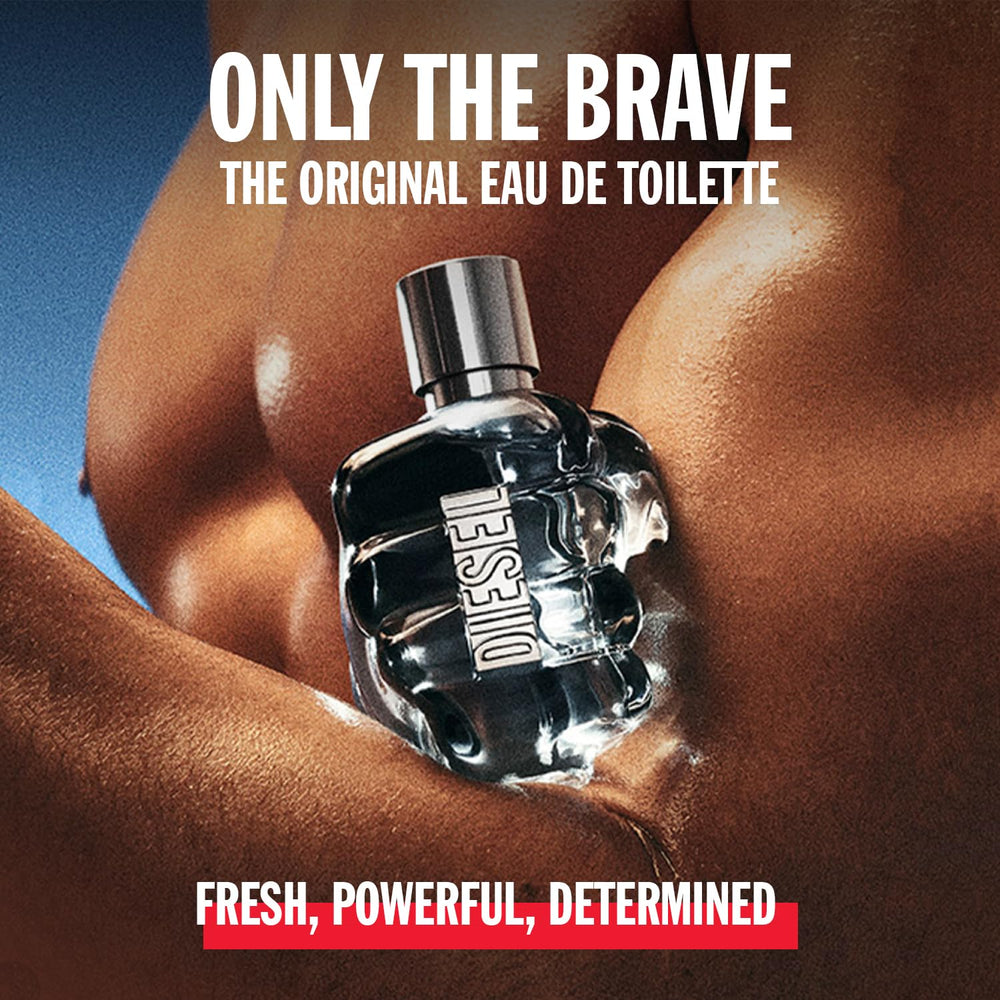 Diesel Only the Brave embossed fist logo close-up signifying strength-inspired design.