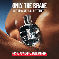 Diesel Only the Brave embossed fist logo close-up signifying strength-inspired design.