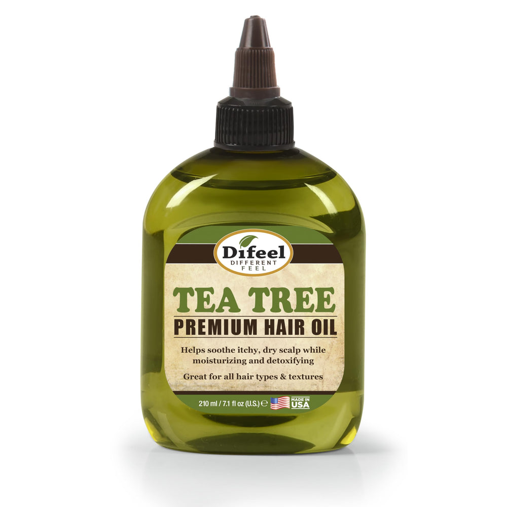 Difeel Tea Tree Oil bottle with pure herb formula for scalp nourishment