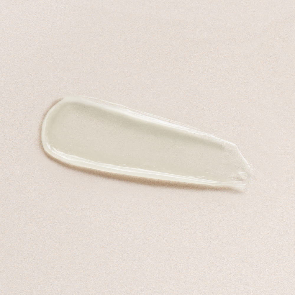 Textura hidratante del bálsamo labial DIME para labios suaves