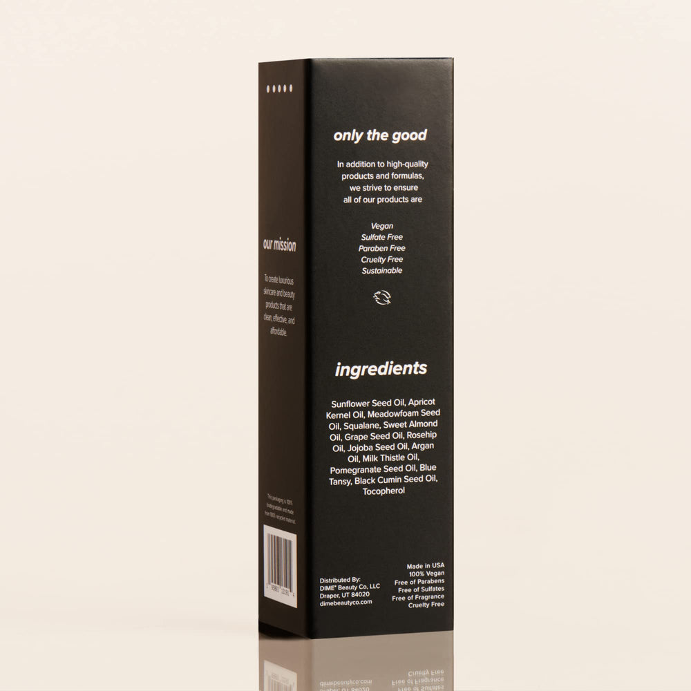 DIME Beauty Blue Facial Oil blemish spot treatment applied to targeted area.