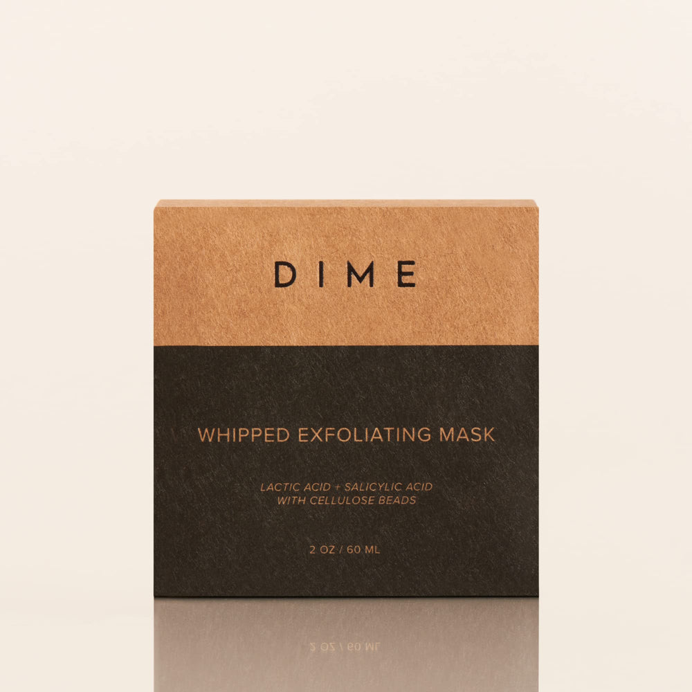 DIME whipped exfoliating mask in hand shows creamy texture ready.