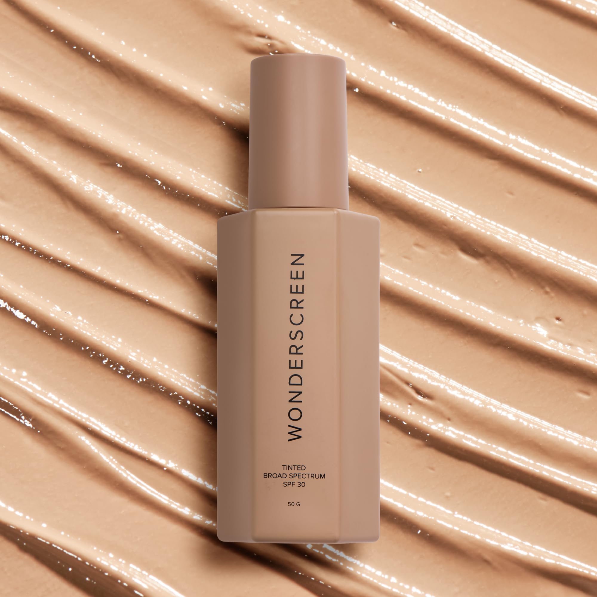 DIME Wonderscreen SPF 30 UV shield with lightweight finish on skin.