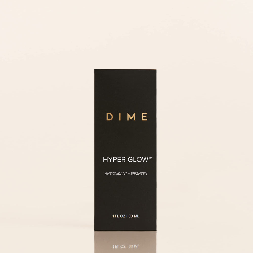 DIME Hyper Glow Serum applied on cheek for a dewy finish