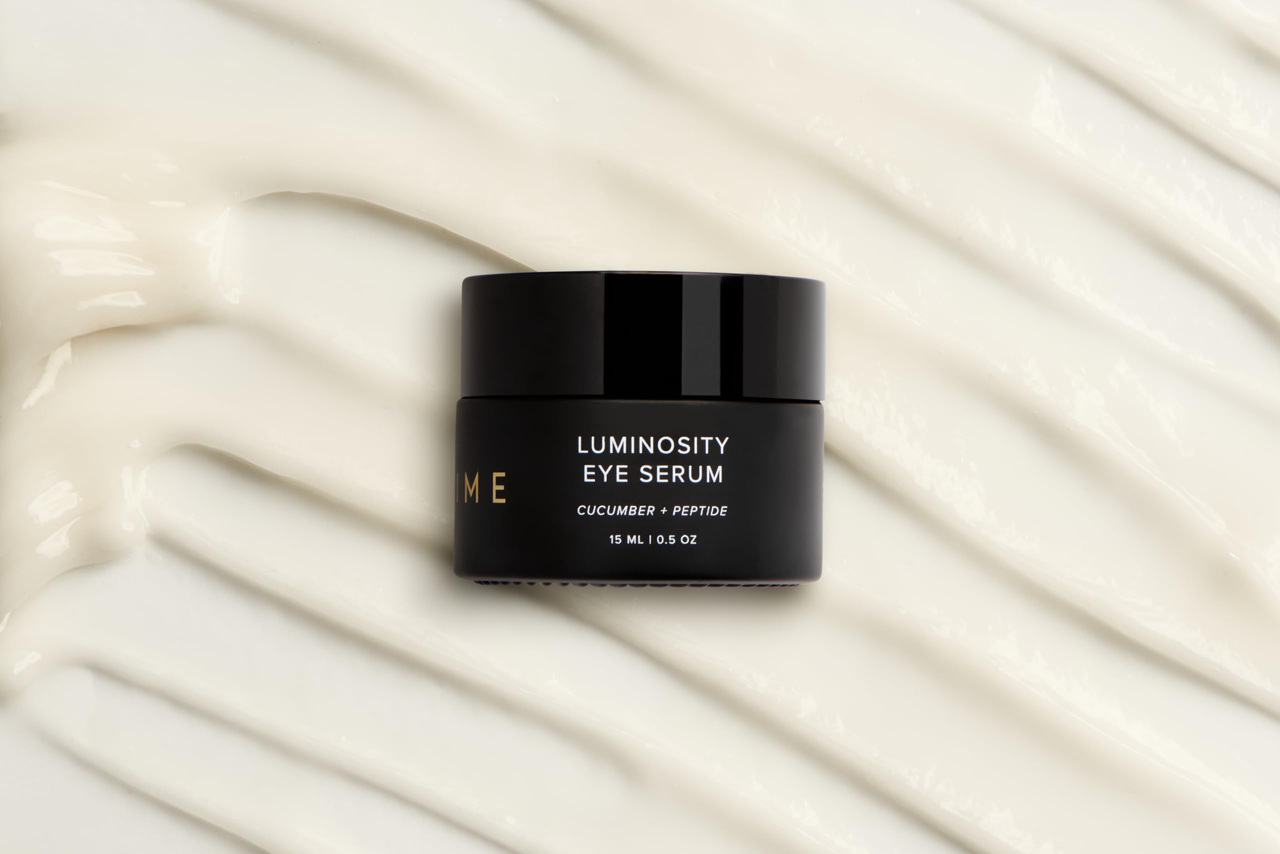 Peptides and vitamin C in DIME Serum support delicate under-eye skin health.