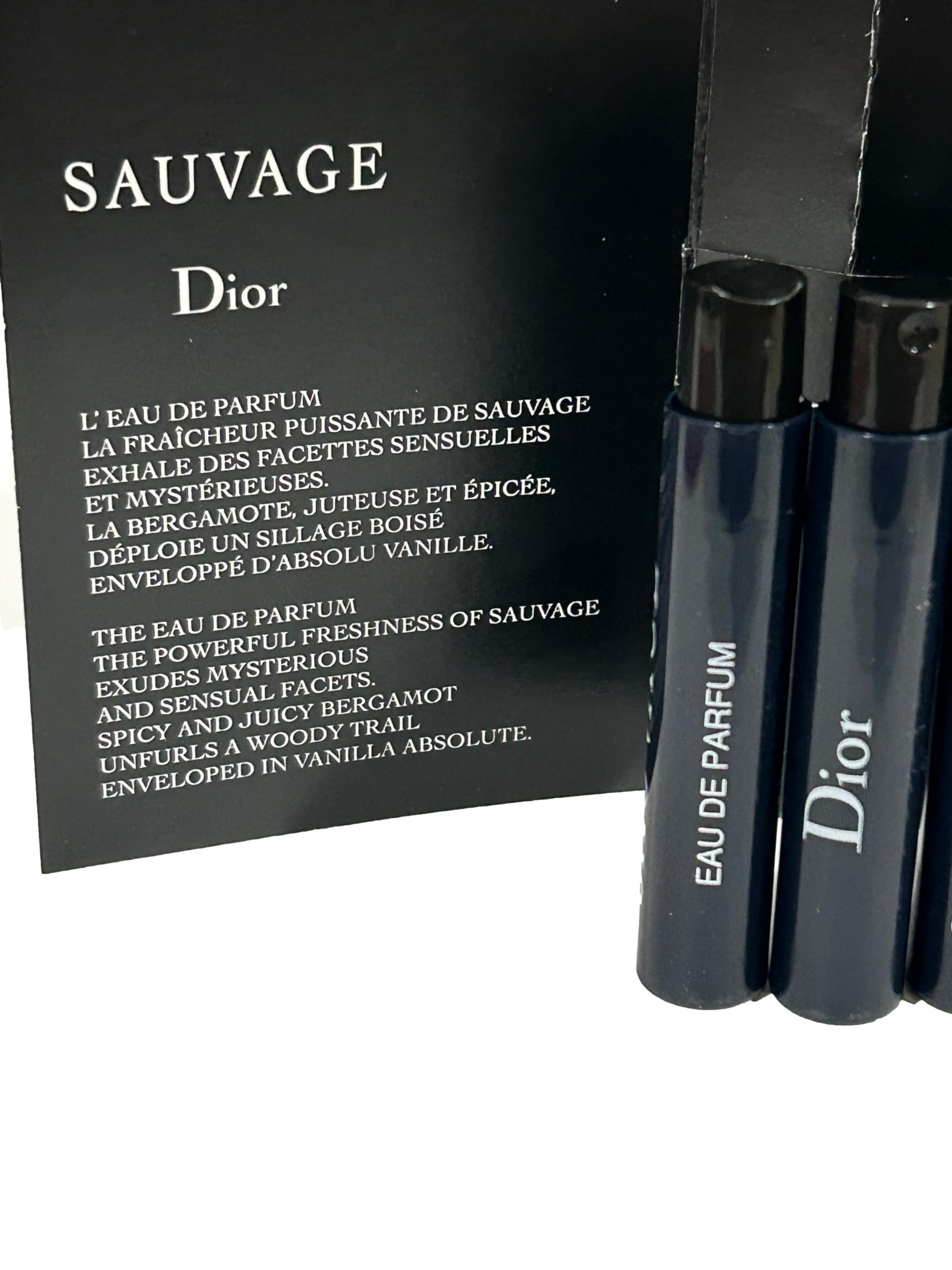 Dior Sauvage EDP vial close-up showing compact travel size